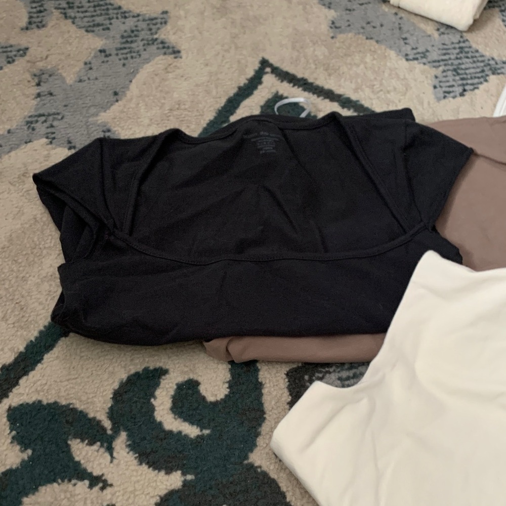 9 top bundle assorted sizes and colors some have not been worn 9 for 25
